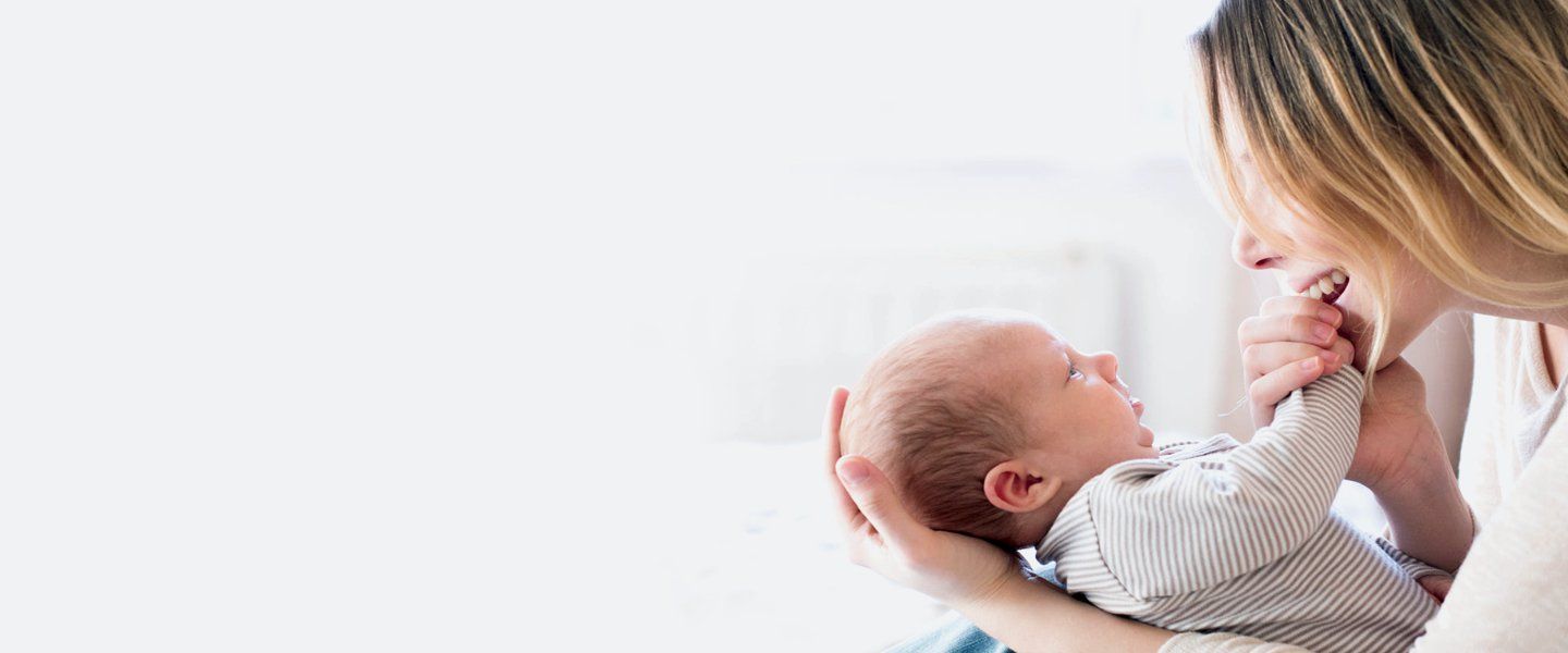 Mother holding newborn baby